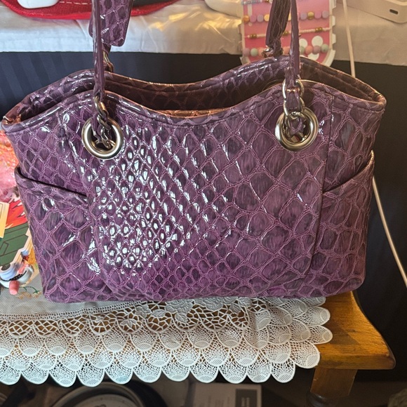 Nicole Miller Crocodile Purple Small Bag ..
Width 10
Length 7 - Picture 4 of 6